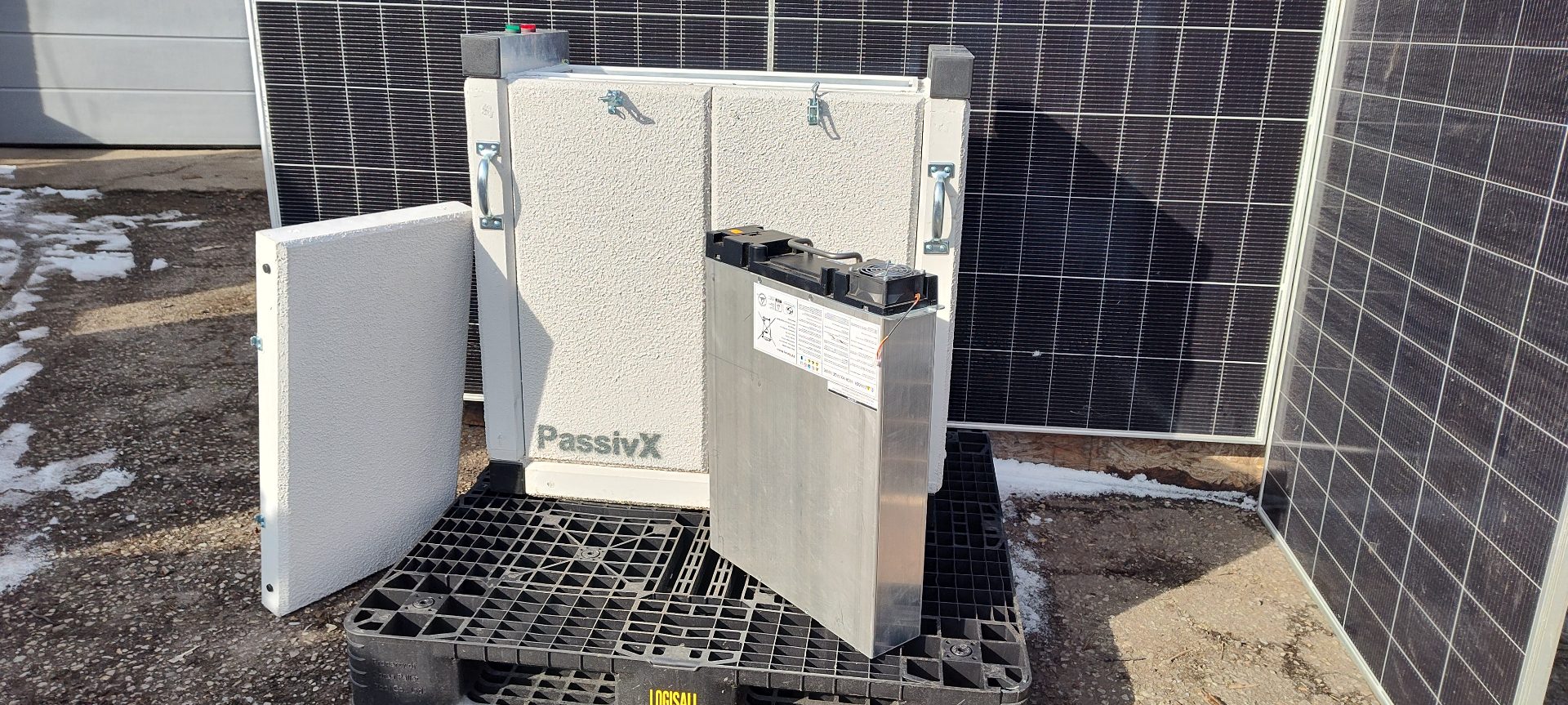 PassivX PX-UNIT-30 battery next to open unit